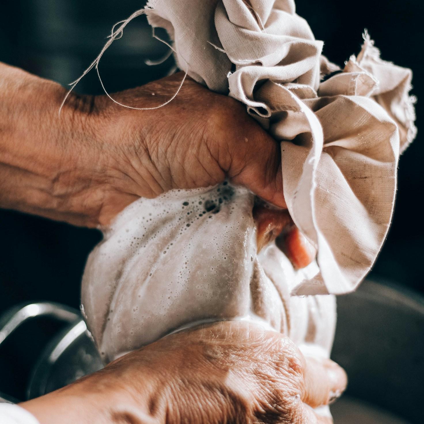 Community members collaborating in a contemporary kitchen, exchanging recipes and techniques